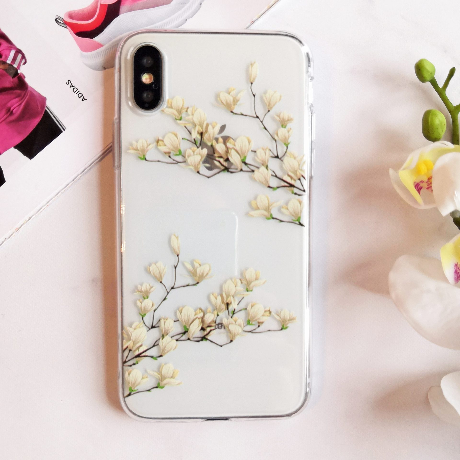 Etui do iPhone X/XS silikonowe z kwiatami magnolii