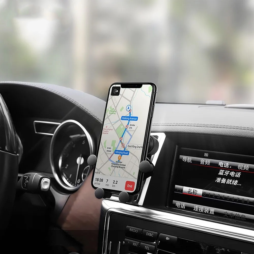 Uchwyt samochodowy dostosowuje się do telefonu, mocowanie do kratki wlotu